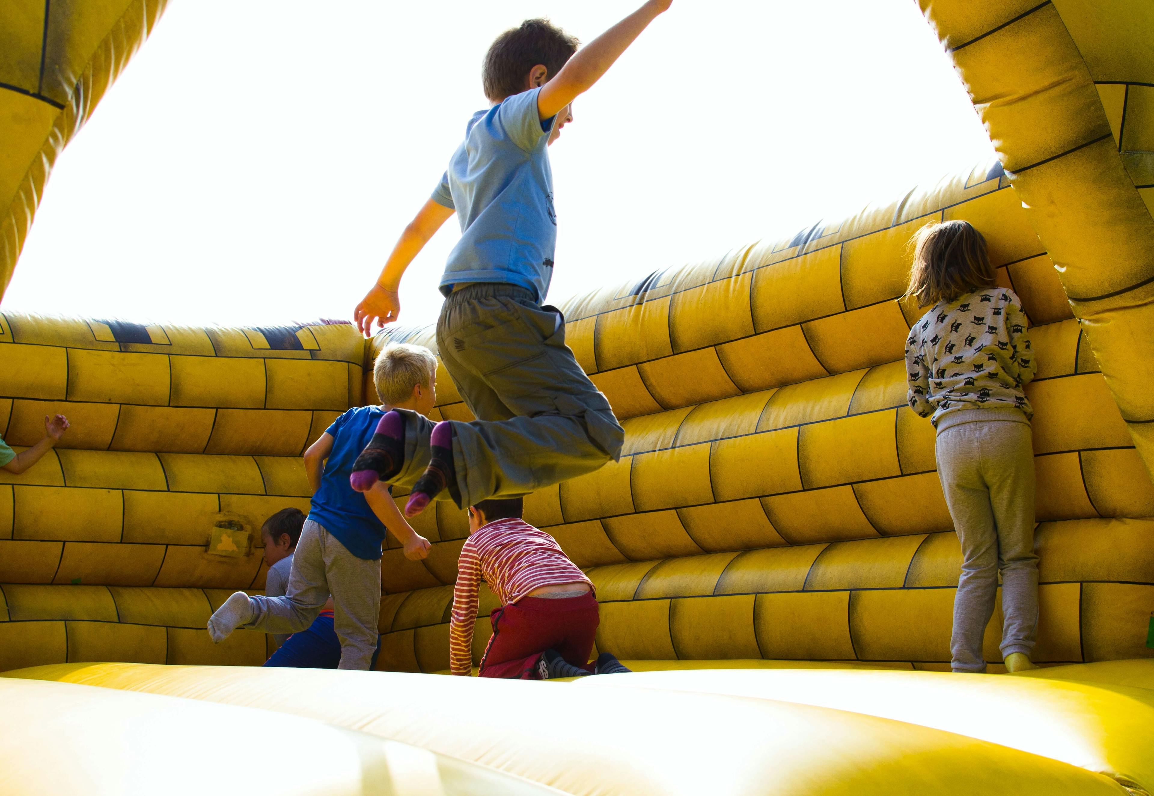 Kids playing on an inflatable